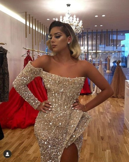 Looking for Prom Dresses, Evening Dresses in Sequined,  Mermaid style,  and Gorgeous work? stylesnuggle has all covered on this elegant Chic Crystal Beading One-shoulder Strapless Slit Mermaid Sequins Prom Gowns.