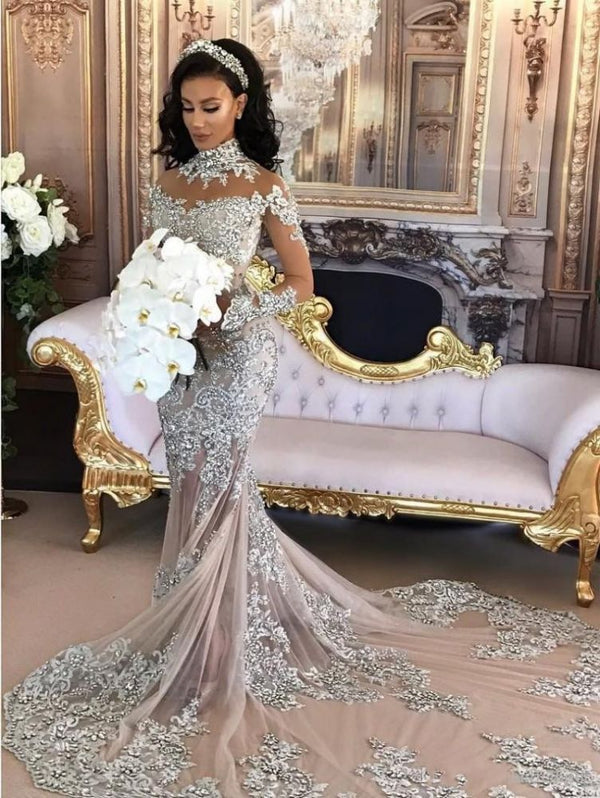Wanna get a dress in Mermaid style, and delicate Lace,Crystal work? stylesnuggle custom made you this Classic High neck Long Sleevess Mermaid Wedding Dress Silver Tulle Bridal Gowns with Lace Appliques at factory price.