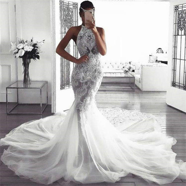 stylesnuggle custom made this mermaid sleeveless halter wedding dress online, we sell dresses online all over the world. Also, extra discount are offered to our customs. We will try our best to satisfy everyoneone and make the dress fit you well.