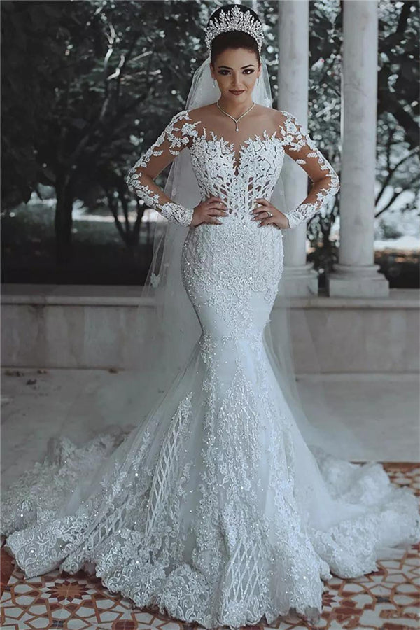 stylesnuggle custom made this Long Sleeves lace wedding dress for you, we sell dresses online all over the world. Also, extra discount are offered to our customs. We will try our best to satisfy everyoneone and make the dress fit you.