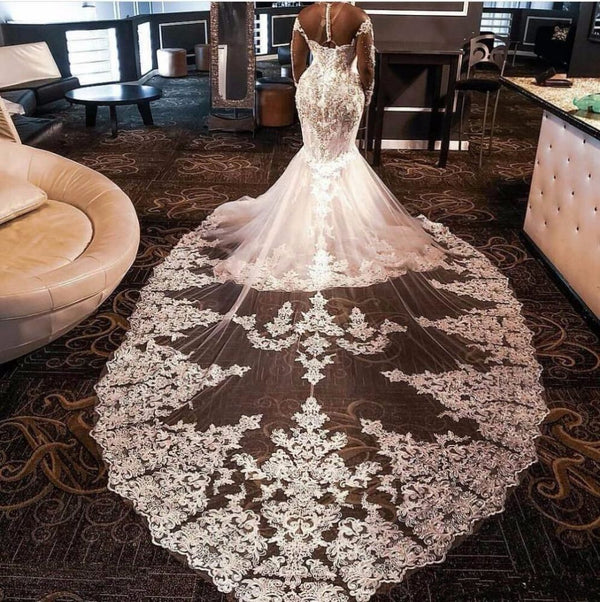 stylesnuggle offers Luxurious Long Sleevess Beading Appliques Rhinestones Mermaid Wedding Dress with Sweep Train at a good price ,all made in high quality. All sold at reasonable price