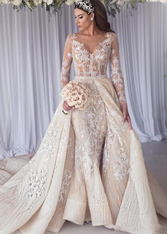 Inspired by this wedding dress at stylesnuggle.com,Mermaid style, and Amazing Lace work? We meet all your need with this Classic Modern Long Sleeves Lace Mermaid Overskirt Wedding Dress Bridal Gowns.