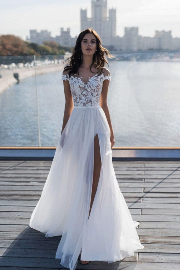 This Off The Shoulder Appliques A-line Wedding Dresses Side Split Tulle Bridal Gowns at stylesnuggle comes in all sizes and colors. Shop a selection of formal dresses for special occasion and weddings at reasonable price.