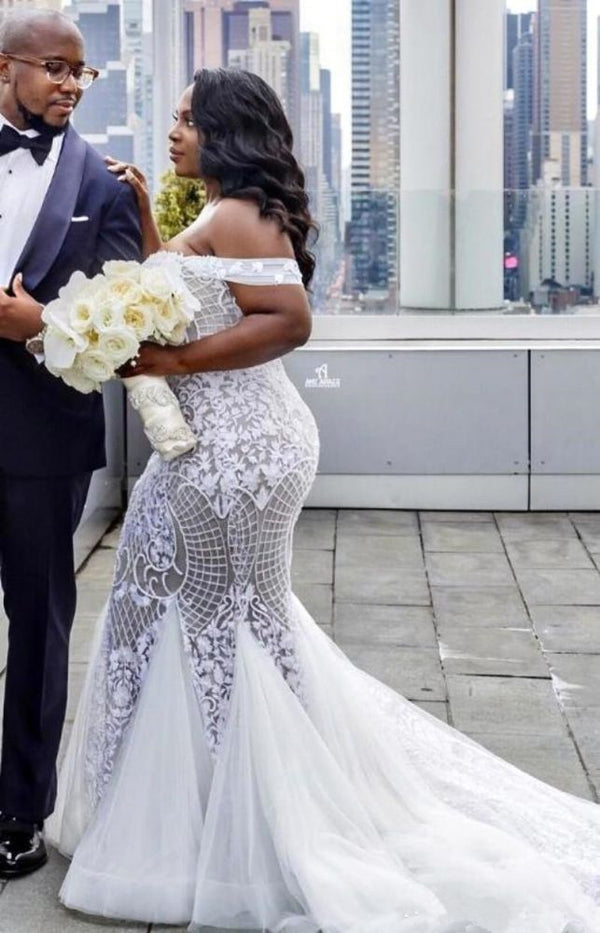Looking for a dress in , Mermaid style, and Amazing Appliques work? stylesnuggle custom made you this Off-the-shoulder Lace Mermaid Plus Size Wedding Dresses.