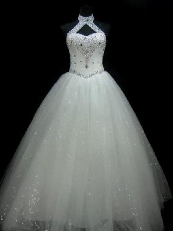 This beautiful Sequin Ball Gown Sleeveless Beading Tulle Halter Wedding Dresses at stylesnuggle.com will make your guests say wow. Shop today to get the discount. 