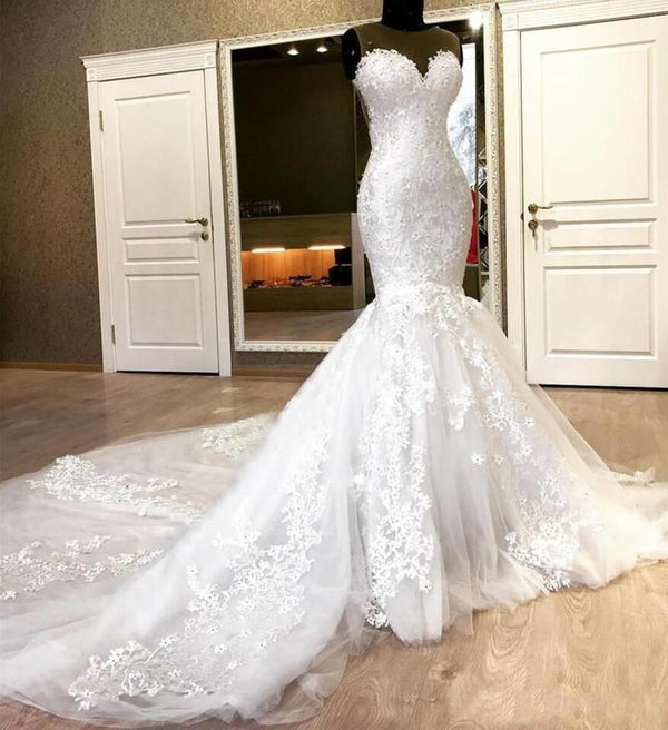 stylesnuggle offers Sweetheart White Illusion neck Mermaid Beaded Lace Wedding Dress online at an affordable price from Tulle to Mermaid skirts. Shop for Amazing Sleeveless wedding collections for your big day.