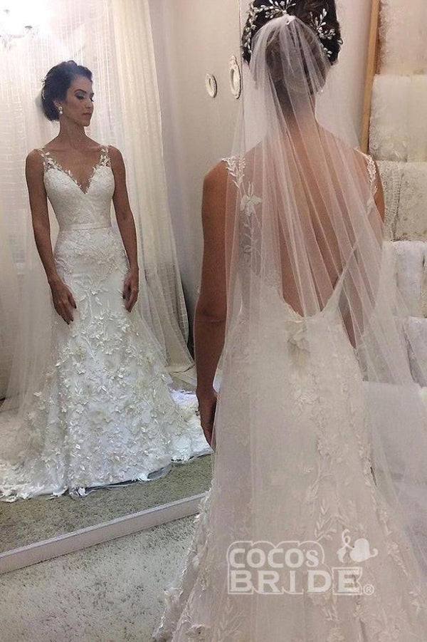 stylesnuggle offers V-neck sleevless Mermaid White Wedding Dress with Court Train online at an affordable price from Tulle to Column Floor-length skirts. Shop for Amazing Sleeveless wedding collections for your big day.